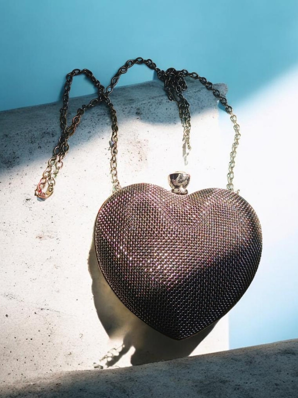 Expressions Black Heart-Shaped Clutch with Pink Label and Silver Frame